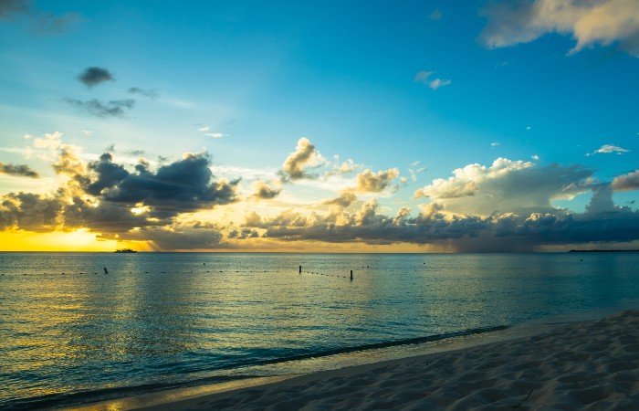 Late sunset over the sea on 7 Mile Beach , Cayman Islands