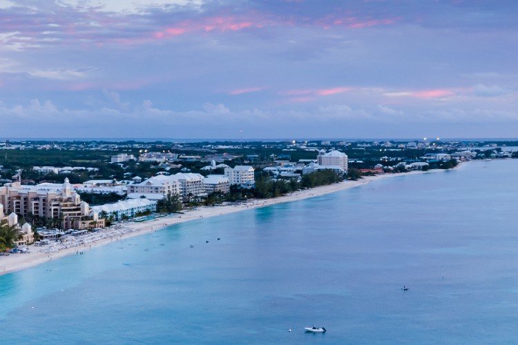 Line of condo buildings along 7 mile beach, Cayman Islands